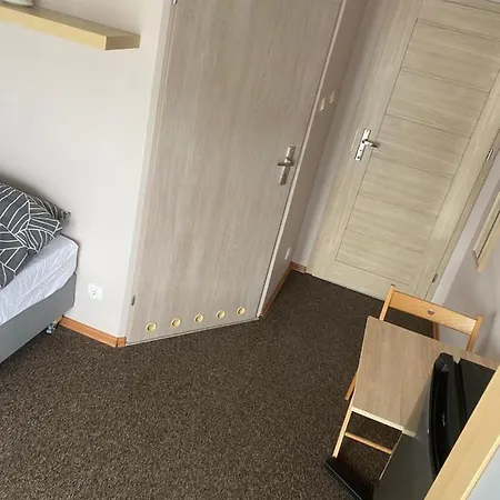 Quarto em Acomodações Particulares Goscinne 