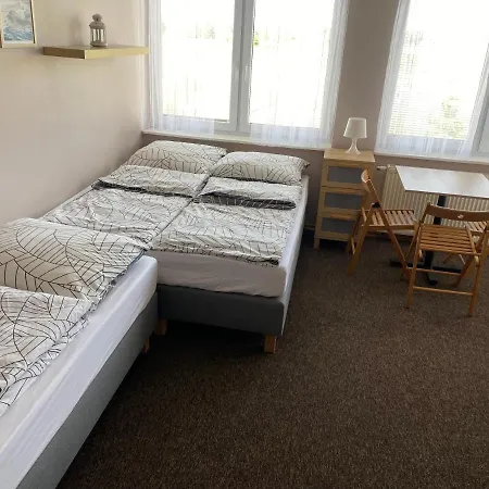 Quarto em Acomodações Particulares Goscinne 